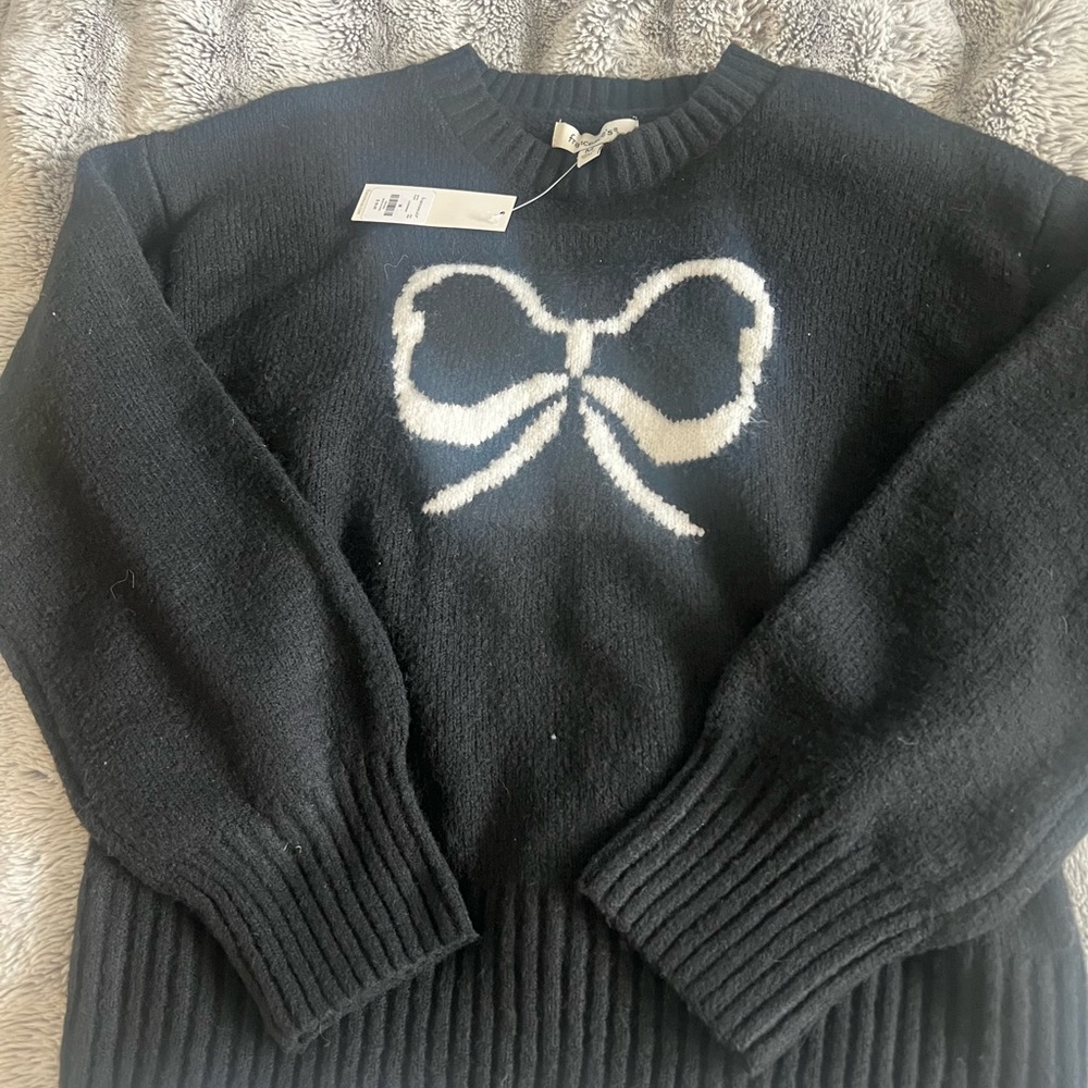 Black Sweater with White Bow Design